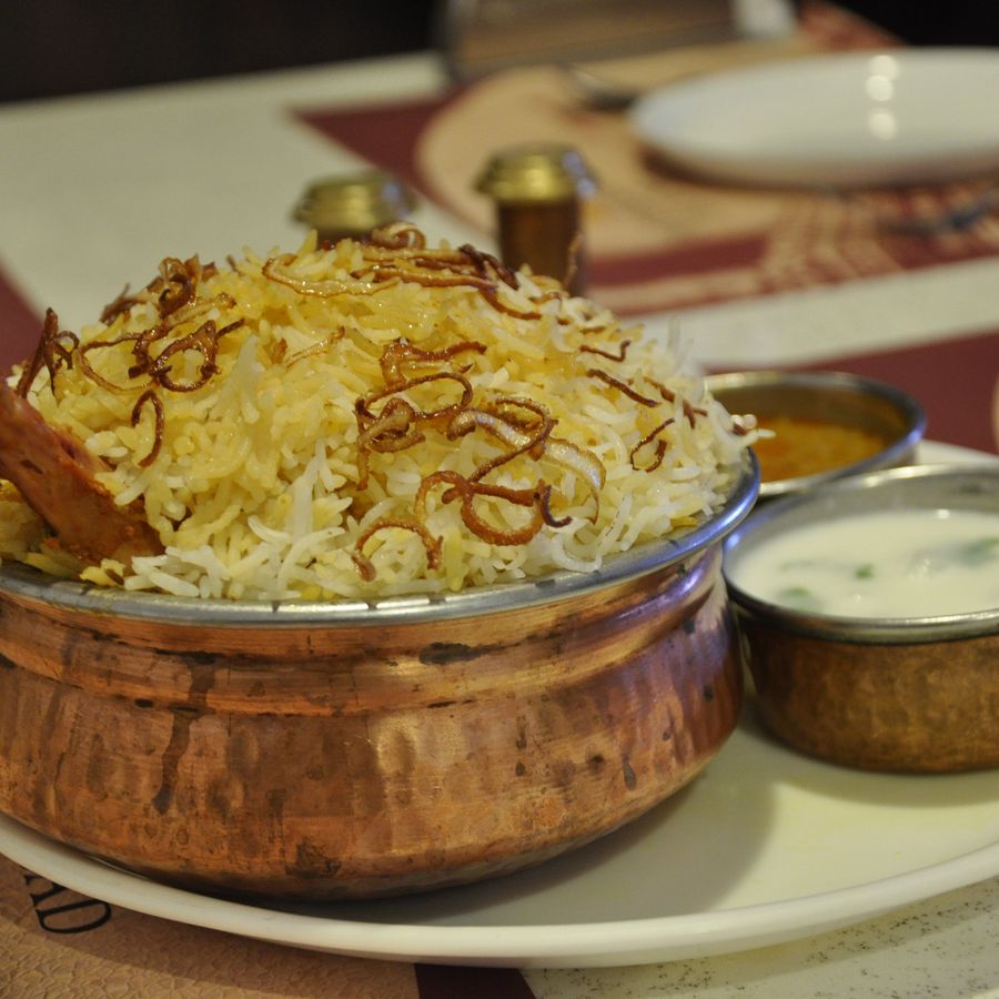 Hyderabadi chicken dum biryani cooked with saffron and whole spices