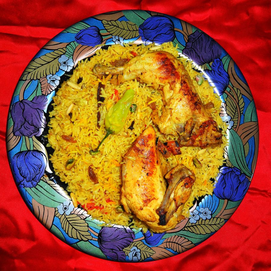 Golconda Special Mandi curry served in a traditional bowl